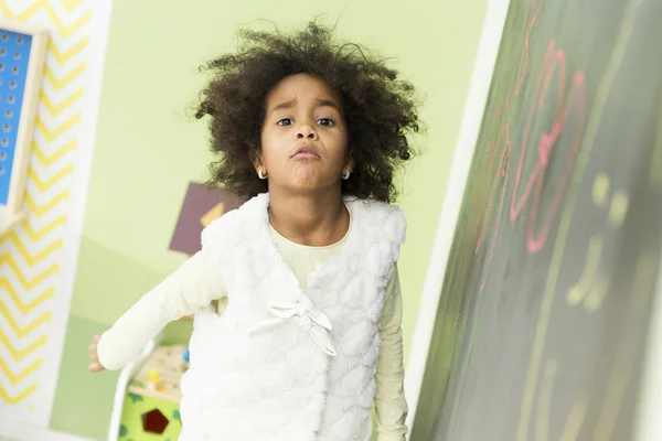 Little girl in the kindergarden — Stock Photo, Image