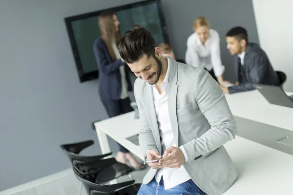 Young man with a phone — Stock Photo, Image