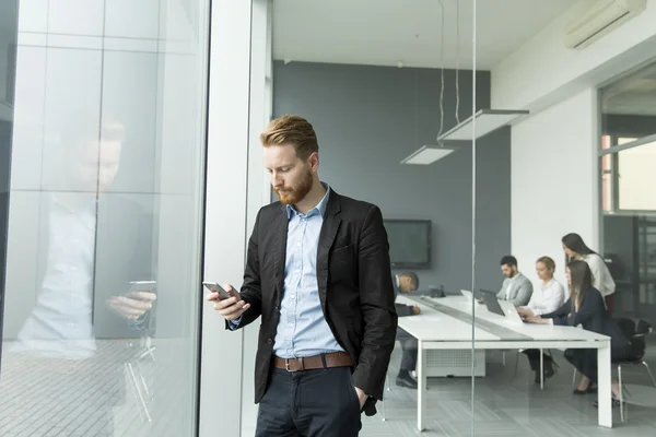 Young businessman in the office — Stock Photo, Image