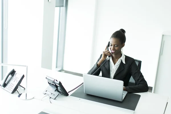 Young woman in the office — Stock Photo, Image