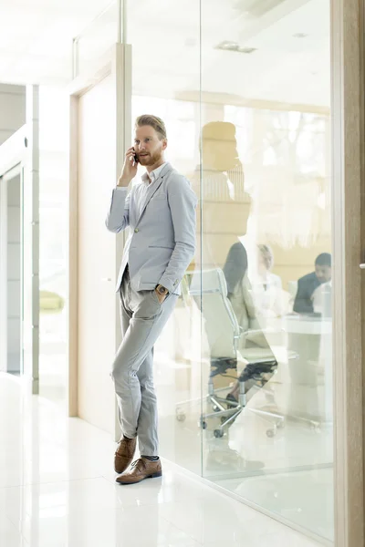 Young man in the office — Stock Photo, Image