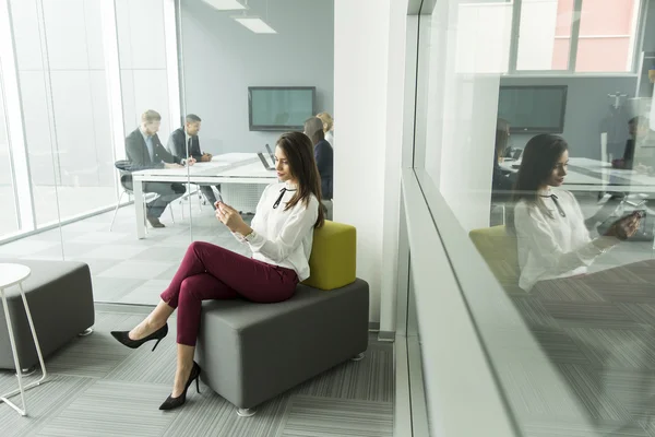 Young woman in the office — Stock Photo, Image