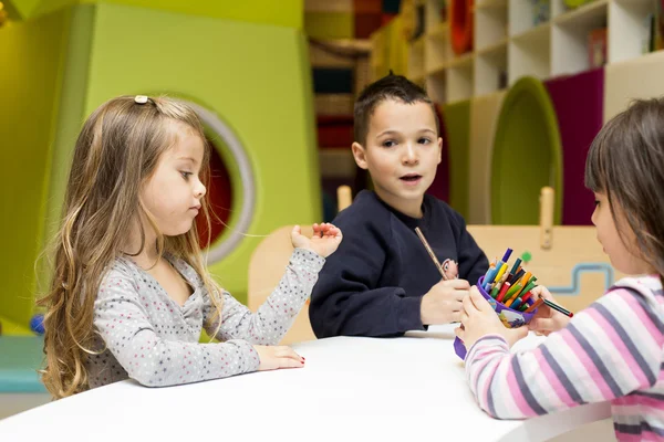 Children drawing at playroom — Stock Photo, Image