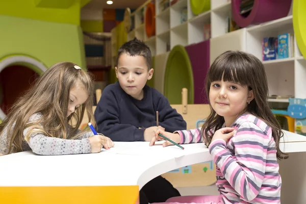 Children drawing at playroom — Stock Photo, Image