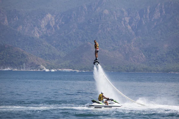 Unidentified man on flyboard — Stock Photo, Image