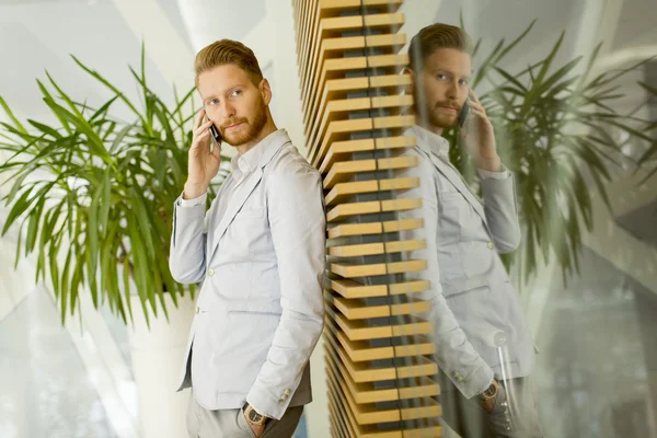 Young man in the office — Stock Photo, Image