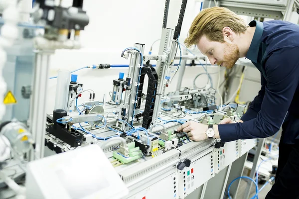 Engineer while working in the factory — Stock Photo, Image