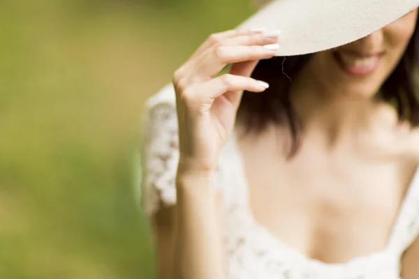 Young woman with a hat — Stock Photo, Image
