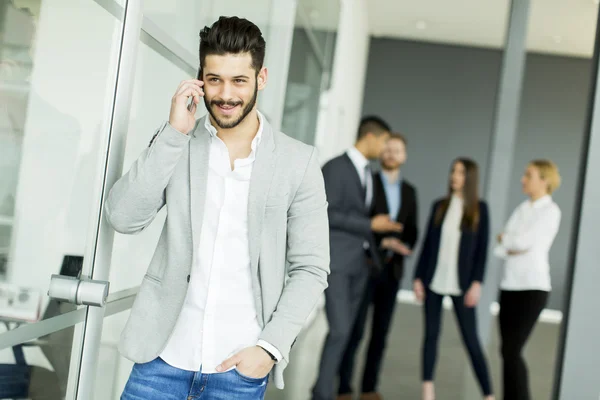 Young man with phone — Stock Photo, Image