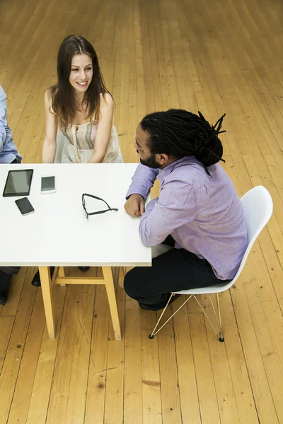 Young multiracial people in the office — Stock Photo, Image