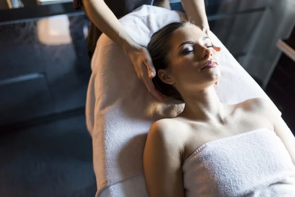 Young woman having a massage — Stock Photo, Image