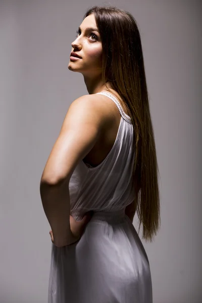 Young woman in white dress — Stock Photo, Image