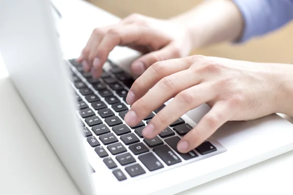 Businessman working on the laptop in the office — Stock Photo, Image