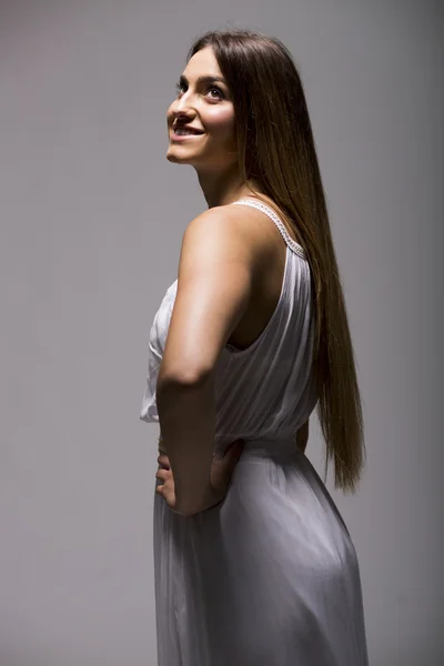 Young woman in white dress