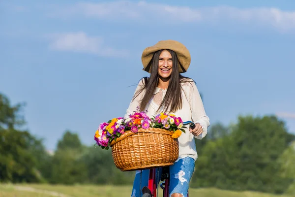 Young girl rides a bicycle — Stock Photo, Image