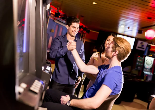 Young people in casino — Stock Photo, Image