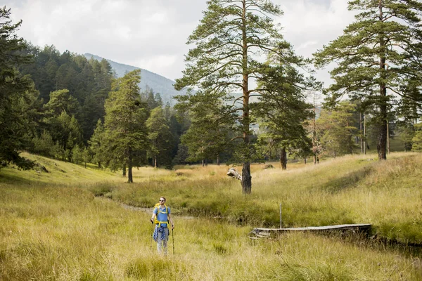 Young man hiking Stock Photo