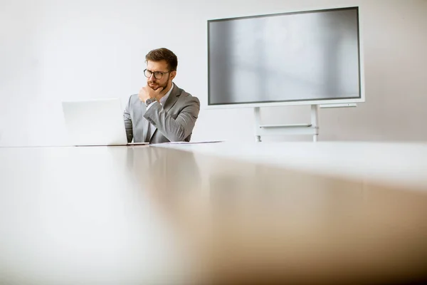 Handsome Young Man Working Laptop Bright Office Big Screen Him — Stock Photo, Image