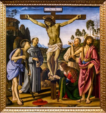 FLORENCE, ITALY - 7 Nisan 2018: Floransa 'daki Uffizi Galerisi' nde 1483-1495 yılları arasında Perugino ve Signorelli tarafından çarmıha gerilme. Sergi, yılda 1,5 milyondan fazla ziyaretçiyle İtalya 'nın en çok ziyaret edilen müzeleri arasında yer alıyor.