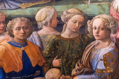 FLORENCE, ITALY - 7 Nisan 2018: İtalya 'nın Floransa kentindeki Uffizi Galerisi' nden Filippo Lippi 'nin Bakire Taç Giyme Töreni (1447). Sergi, yılda 1,5 milyondan fazla ziyaretçiyle İtalya 'nın en çok ziyaret edilen müzeleri arasında yer alıyor.