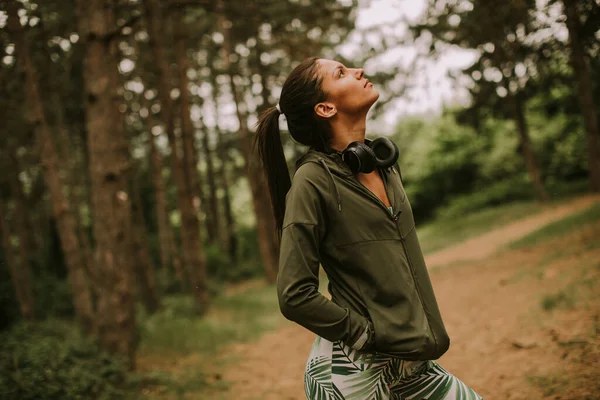 Pretty Young Attractive Female Runner Listening Music Taking Break Jogging — Stock Photo, Image