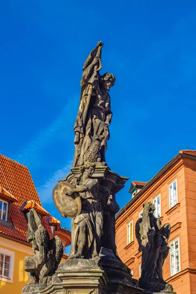 Detail of statue of John the Baptist on Maltese Square in Prague, Czech Republic