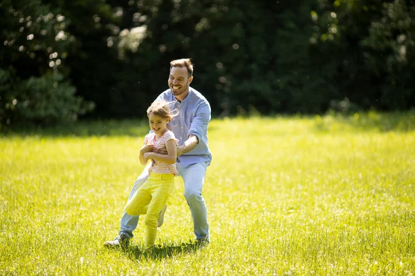 Father Chasing His Cute Little Daughter While Playing Park — Stock Photo, Image