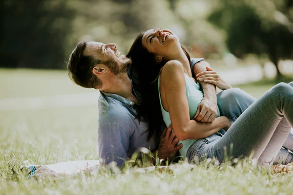 Affectionate Young Couple Sitting Green Grass Park — 图库照片