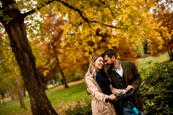 Handsome Young Couple Autumn Park Electrical Bicycle — Stock Photo, Image