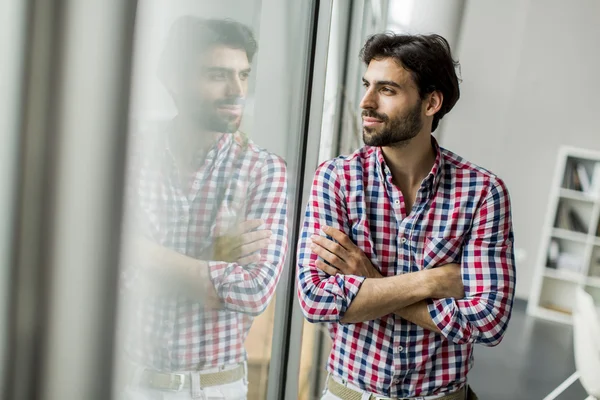 Young man in the office — Stock Photo, Image