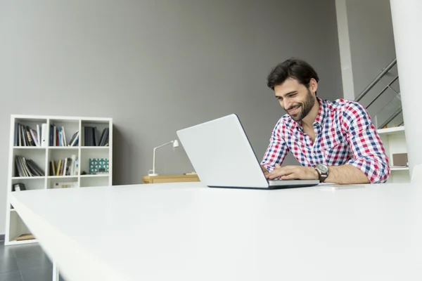 Young man at the office — Stock Photo, Image