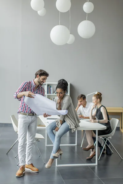 Young people in the office — Stock Photo, Image