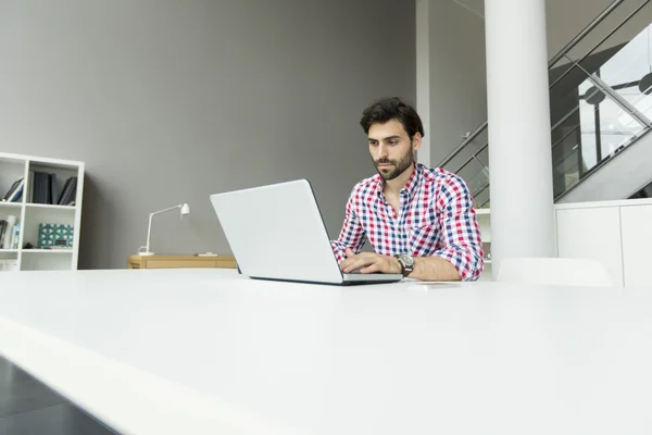 Young man at the office — Stock Photo, Image