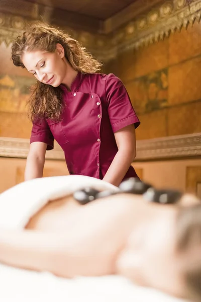 Terapia de massagem de pedra quente — Fotografia de Stock