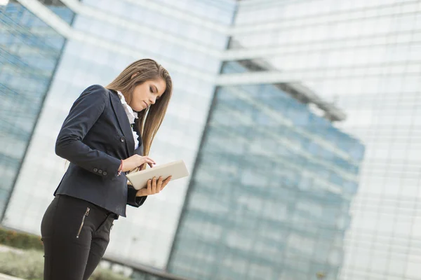 Young businesswoman with tablet Royalty Free Stock Images