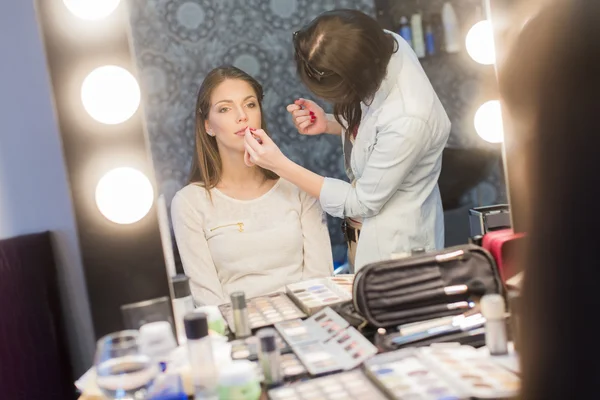 Woman having a makeup — Stock Photo, Image