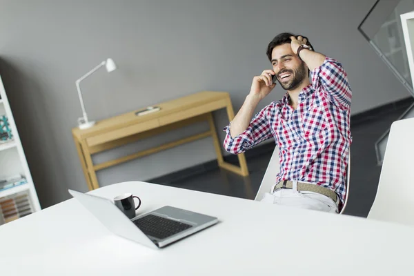 Young man in the office — Stock Photo, Image