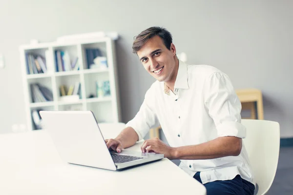 Young man in the office — Stock Photo, Image