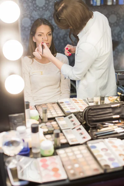 Woman having a makeup — Stock Photo, Image