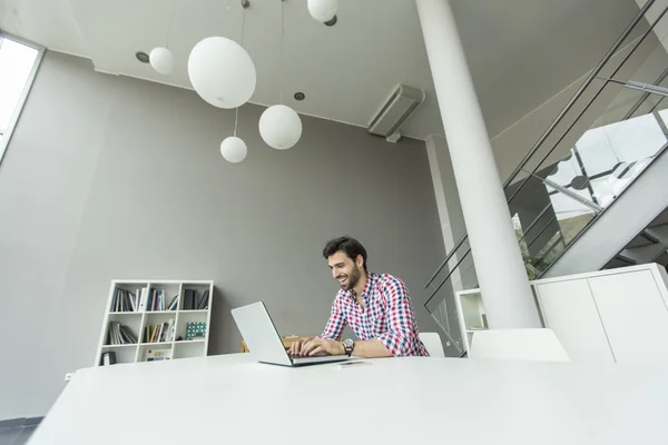 Young man at the office — Stock Photo, Image