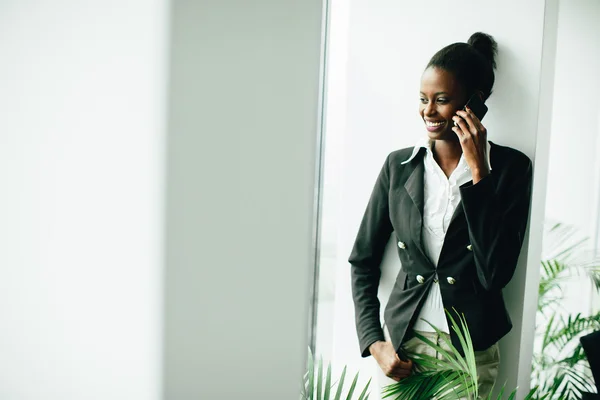 Young woman in the office — Stock Photo, Image