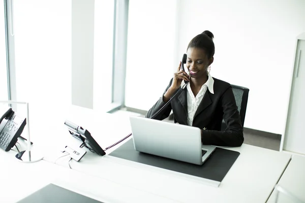 Young woman in the office — Stock Photo, Image