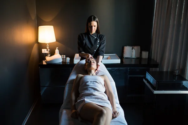 Young woman having a massage — Stock Photo, Image