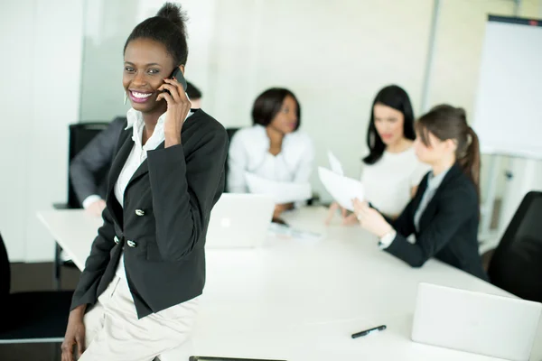 Young woman in the office — Stock Photo, Image