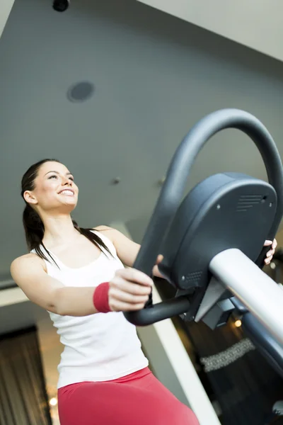 Young woman in the gym — Stock Photo, Image