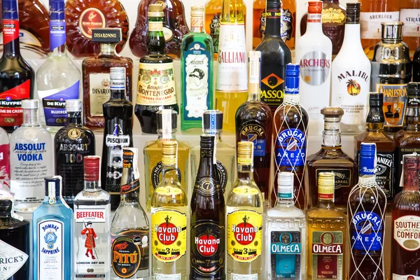 Alcohol bottles in bar — Stok fotoğraf