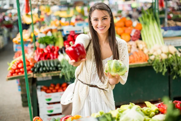 Young woman on the market — Stock Photo, Image