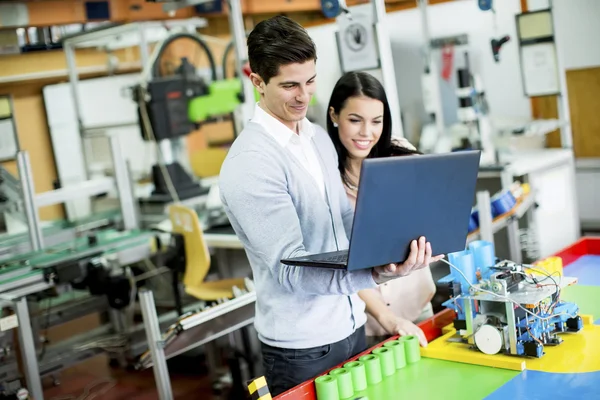 Young people in the classroom — Stock Photo, Image