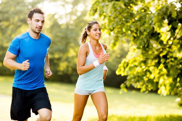 Young couple running