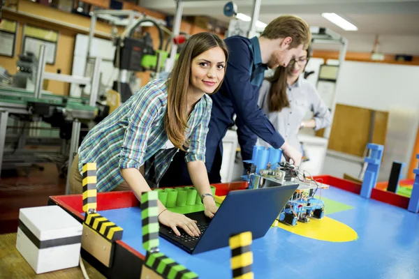 Young people in the classroom — Stock Photo, Image